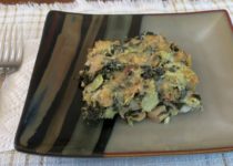 one serving of artichoke spinach mushroom bake on a plate