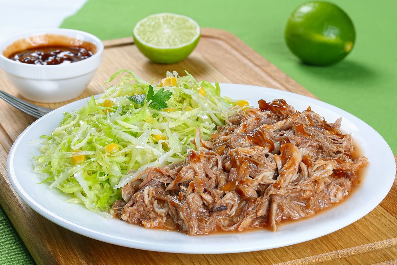 Carnitas on a plate with cole slaw