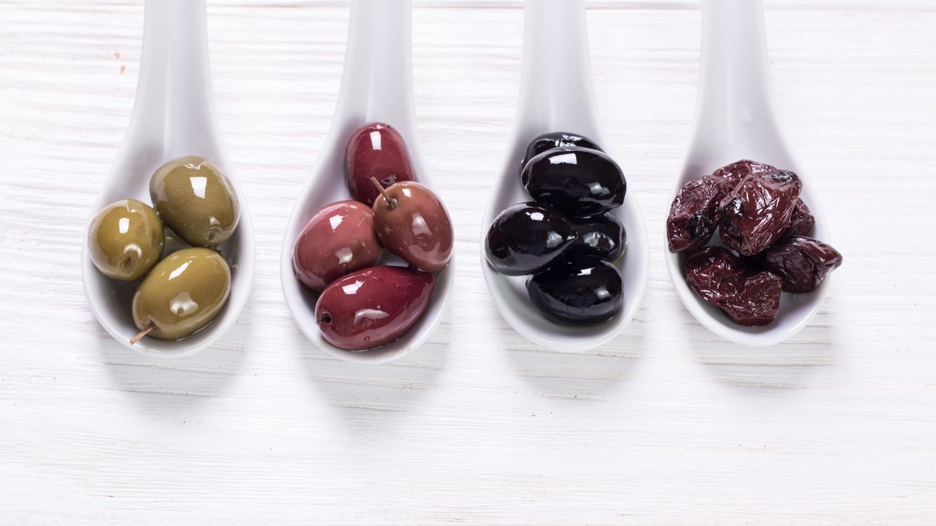 bowls of green,black, pink olives