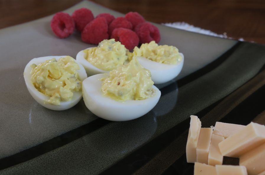 deviled eggs with smoked Gouda and raspberries