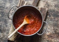 Classic homemade savory sauce in the pan for pizza or meatloaf