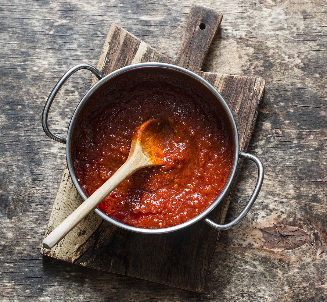 Classic homemade savory sauce in the pan for pizza or meatloaf