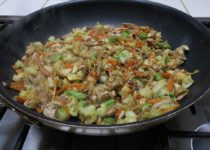 Chicken Garden Vegetable stir-fry steaming in a skillet