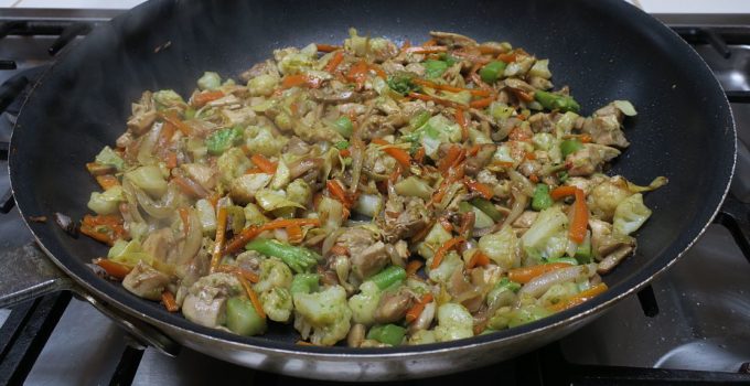Chicken Garden Vegetable stir-fry steaming in a skillet