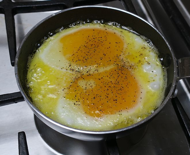 eggs in skillet ready to flip