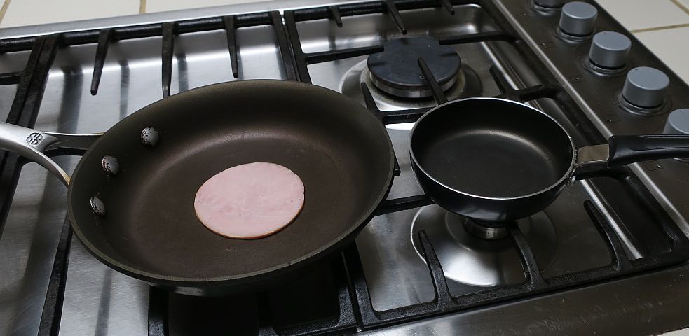 8 inch and 4 3/4 inch skillets on stove