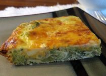 slice of broccoli onion crust-less quiche on a plate